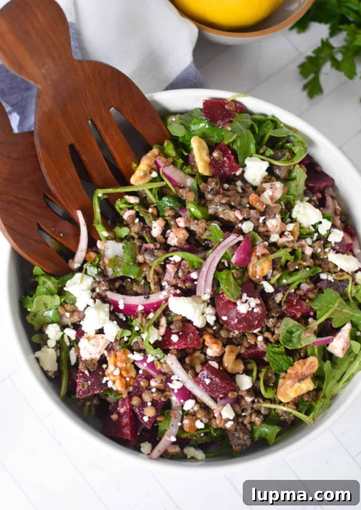 Lentil Beet Salad with two wooden spoons