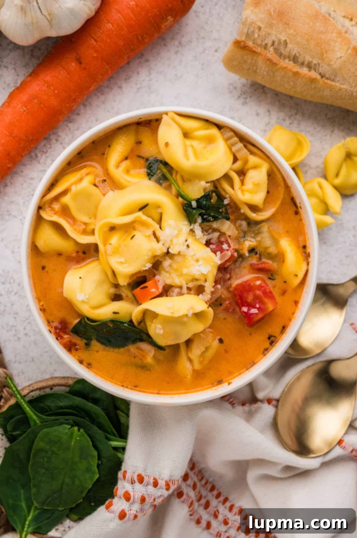 One-Pot Creamy Tortellini Soup with white bowl