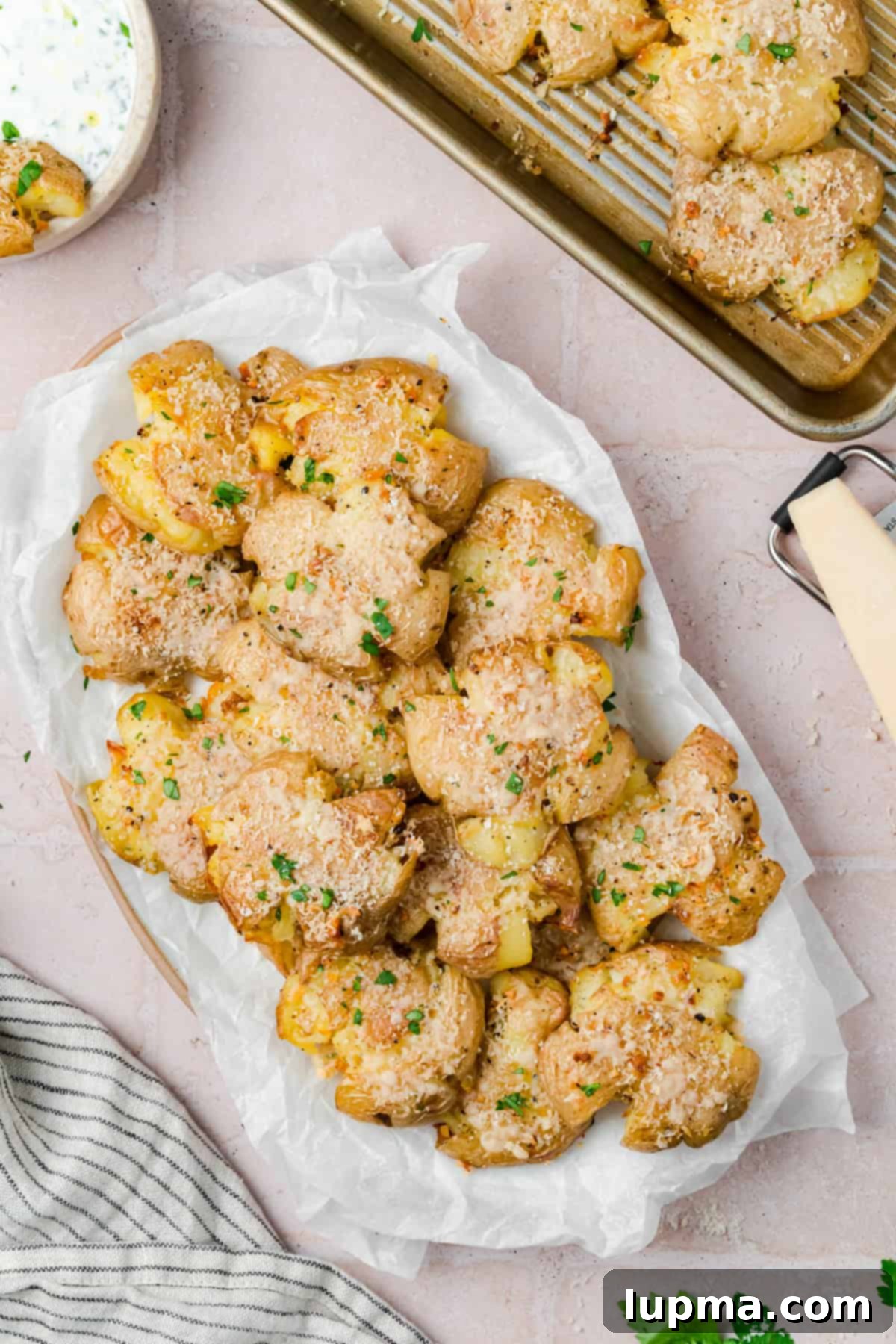 Golden brown smashed potatoes with garlic and parmesan