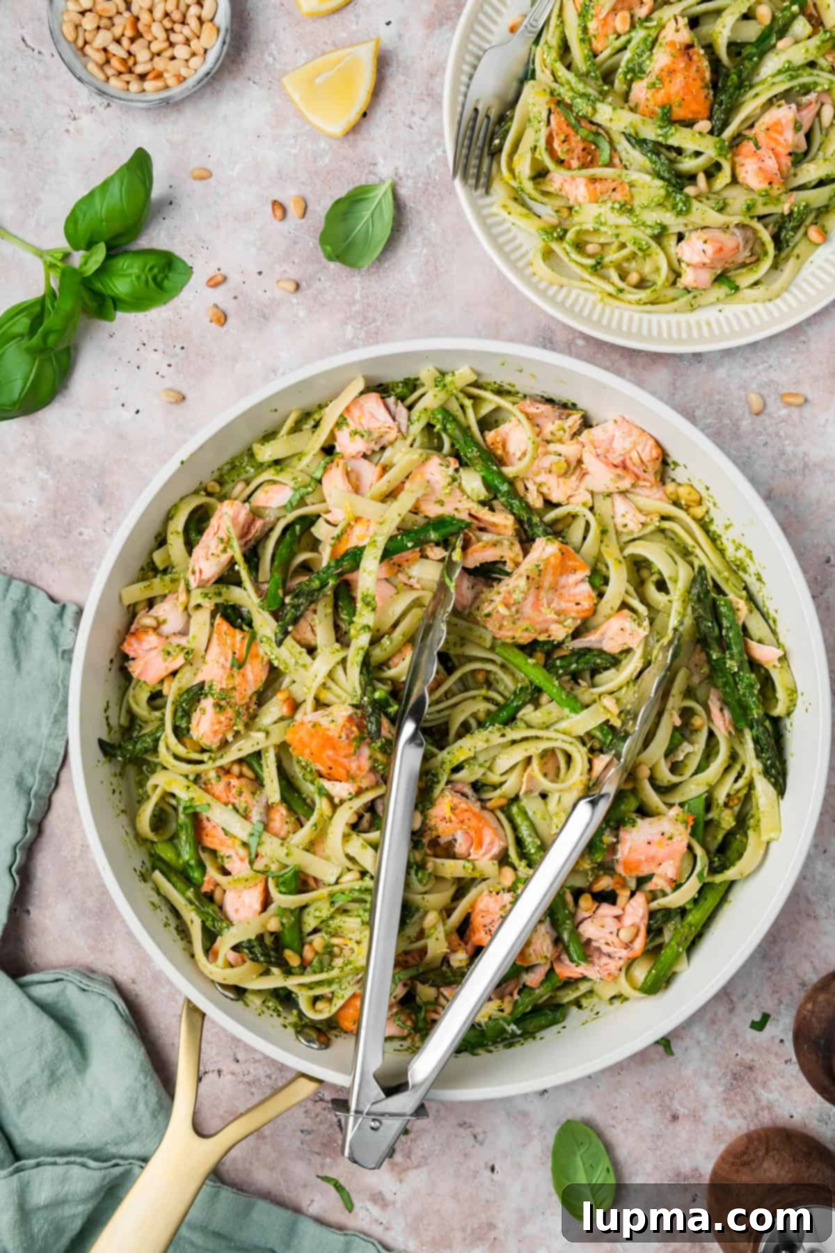 Pesto Pasta with Salmon in a skillet