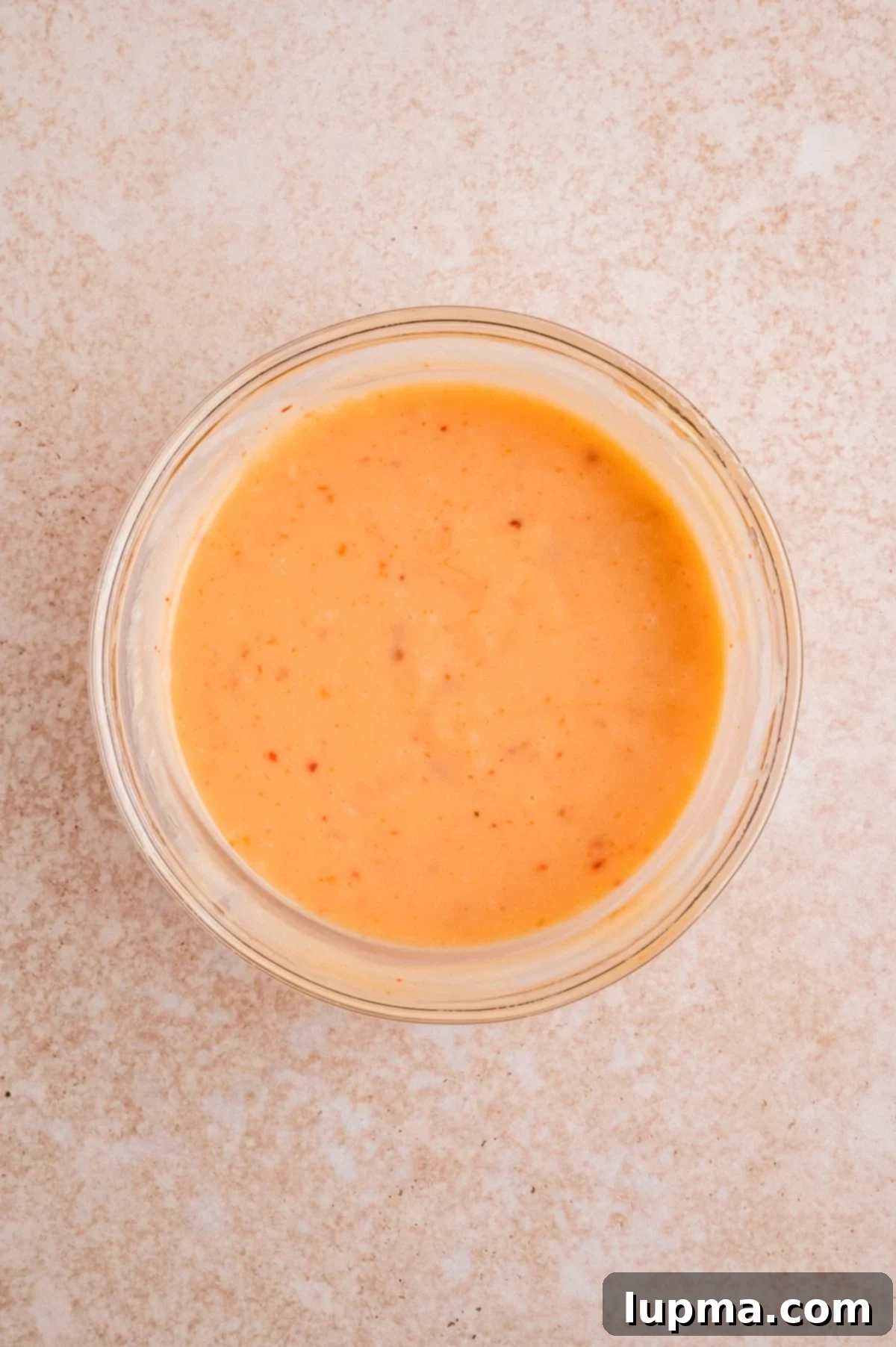 Bang Bang Salmon Sauce in a glass dish 