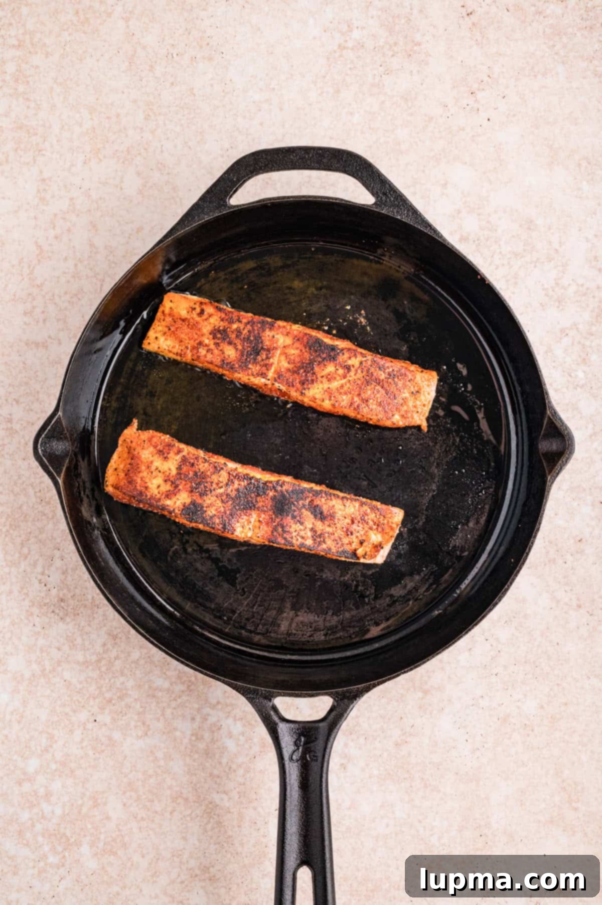 Salmon in a skillet for Bang Band Salmon