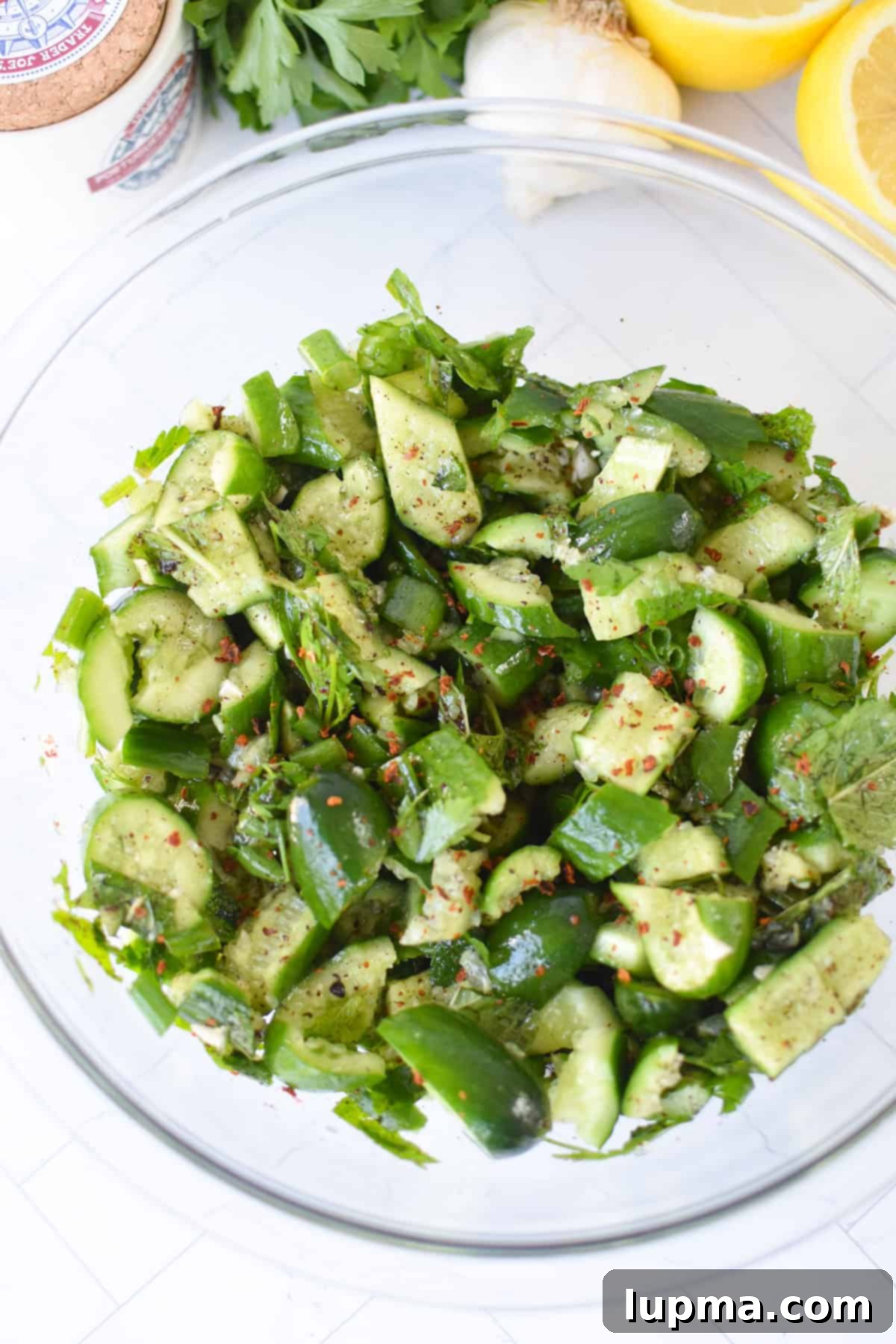Smashed Cucumber Salad with Sumac, Mint, and Lemon, freshly tossed