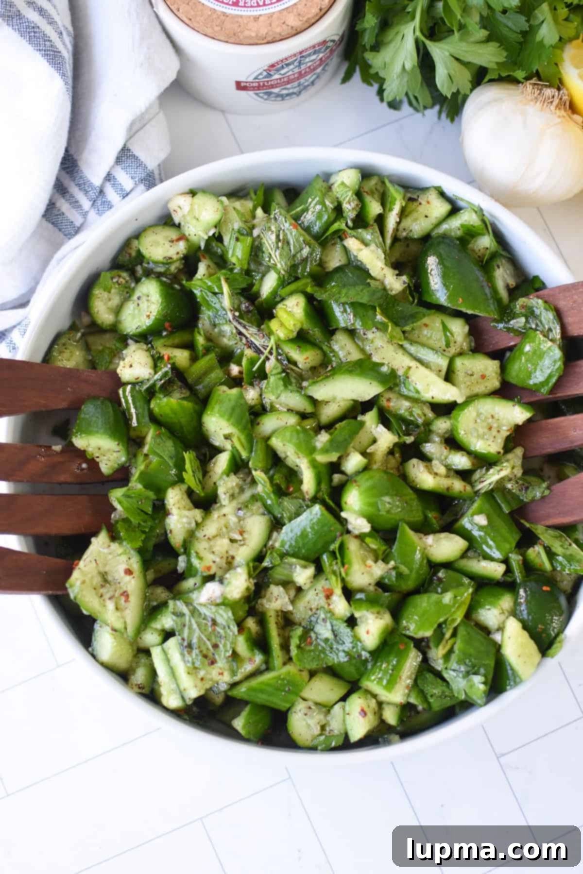 Smashed Cucumber Salad with Sumac, Mint, and Lemon, garnished and ready