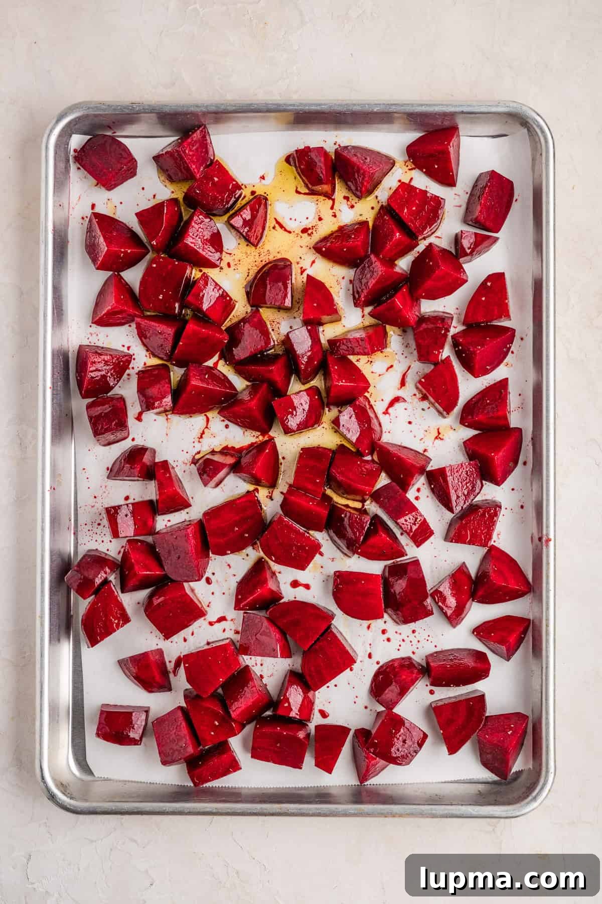 Raw beets on a baking sheet 
