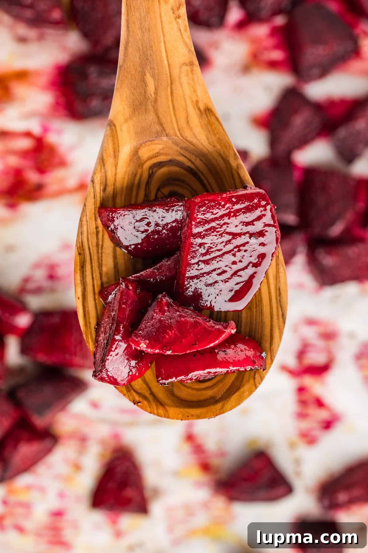 Roasted Beets on a wooden spoon 