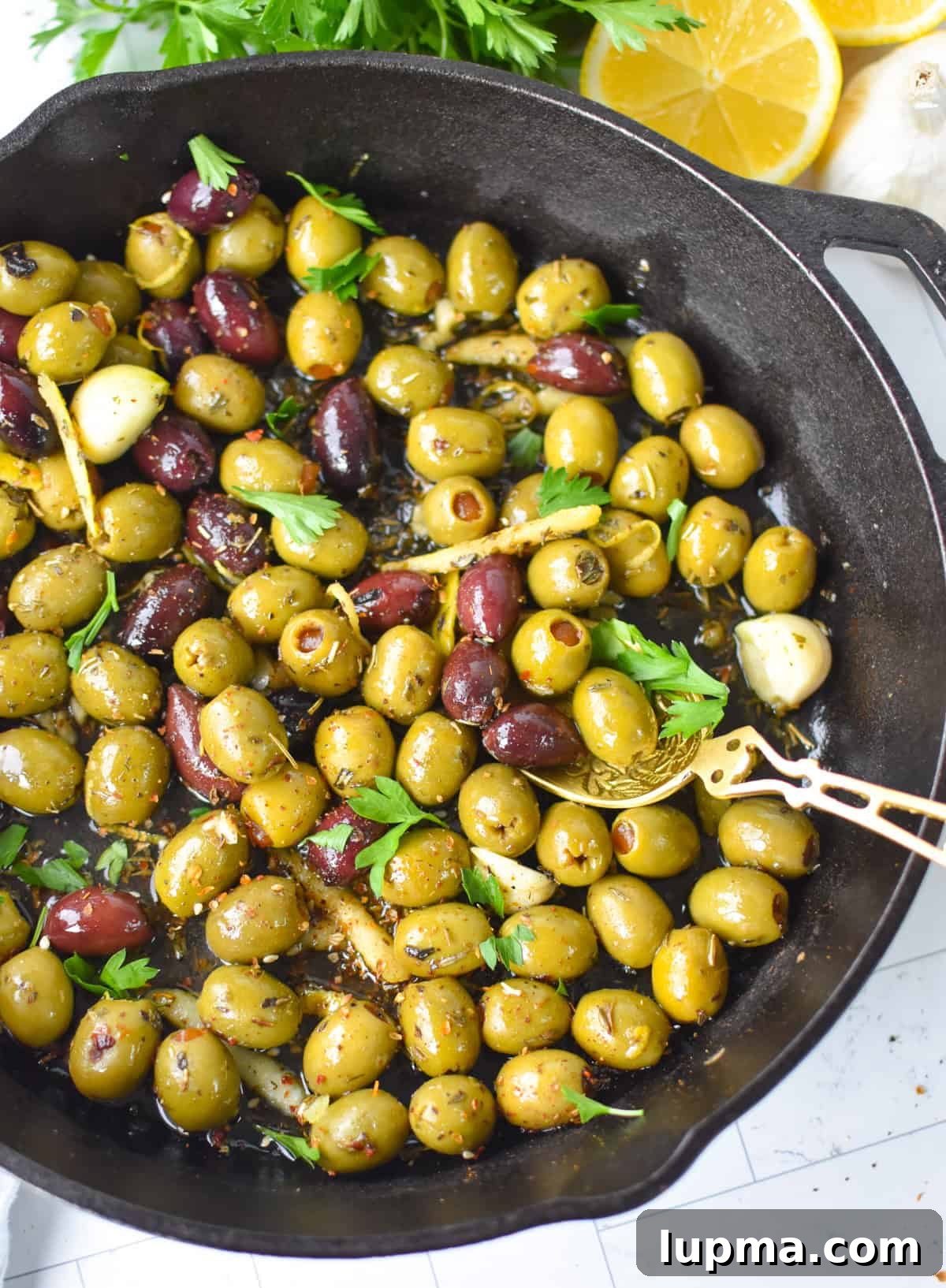 Mediterranean Warm Lemon Olives with Herb Garlic Dip — 10 Minutes 2 Warm olives with lemon and Mediterranean herbs in a skillet