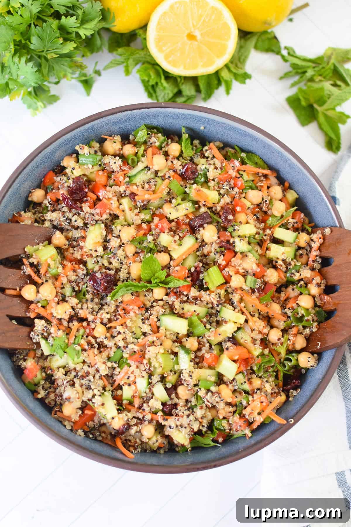 Moroccan Chickpea Salad with Roasted Veggies & Citrus Dressing 2 Easy Moroccan Chickpea Salad in blue bowl