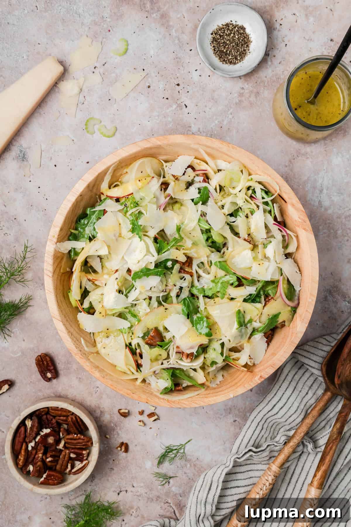 Simple Apple Celery Fennel Salad in a tan bowl 