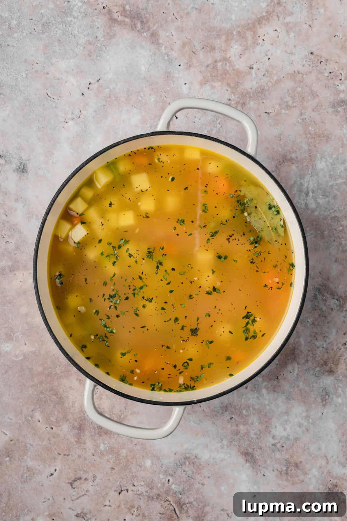 Creamy Chicken and Potato Soup Without Heavy Cream 7 Chicken and Potato Soup Simmering