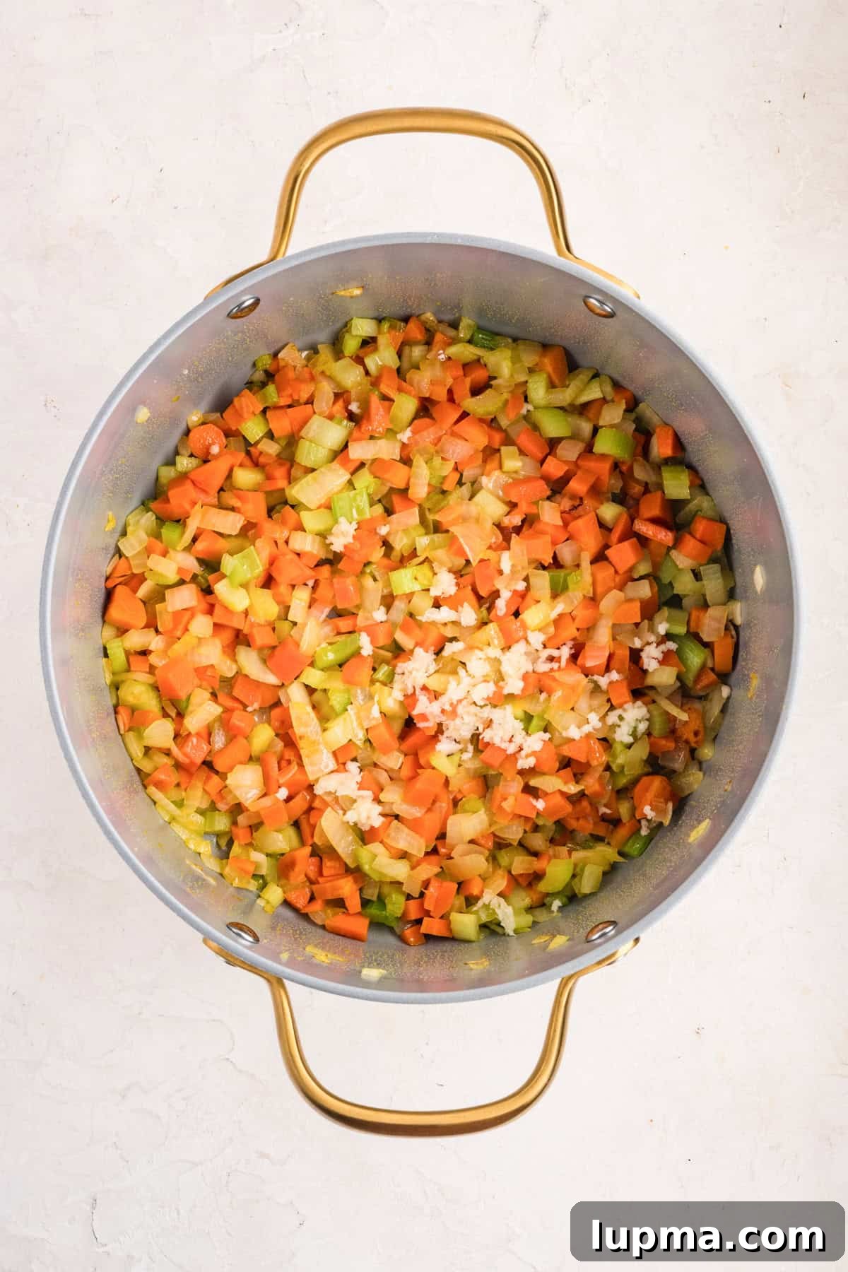 Chicken Pastina Soup: Classic Italian Penicillin Remedy 7 Sauteed vegetable in a pot for Chicken Pastina Soup